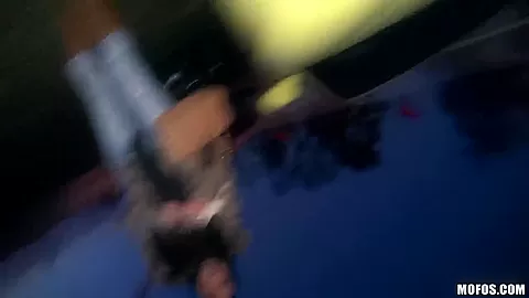 A young girl is offered cash for sex in a lot
