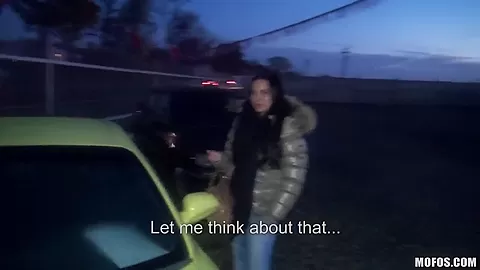 A young girl is offered cash for sex in a lot