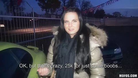 A young girl is offered cash for sex in a lot