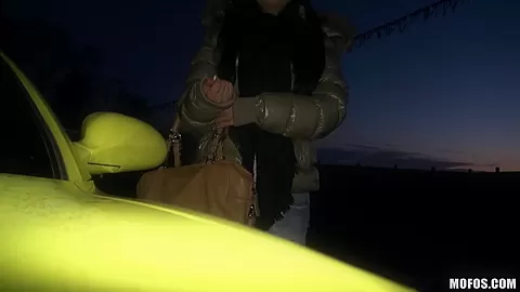 A young girl is offered cash for sex in a lot