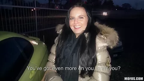 A young girl is offered cash for sex in a lot