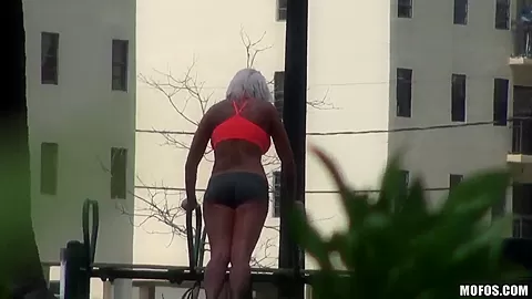 Setaming hot blonde Dee is working out outdoor