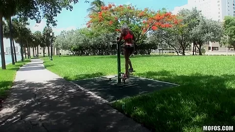 Setaming hot blonde Dee is working out outdoor