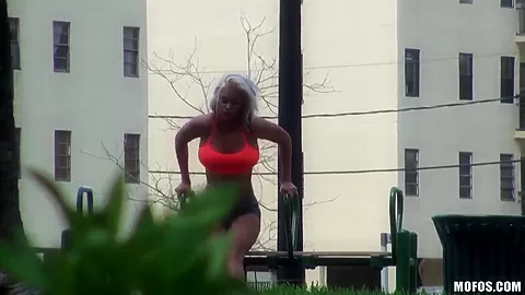 Setaming hot blonde Dee is working out outdoor