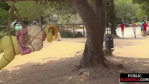 Femsub used in public suspension bondage with spanking