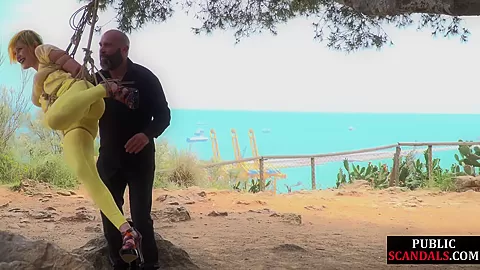 Femsub used in public suspension bondage with spanking