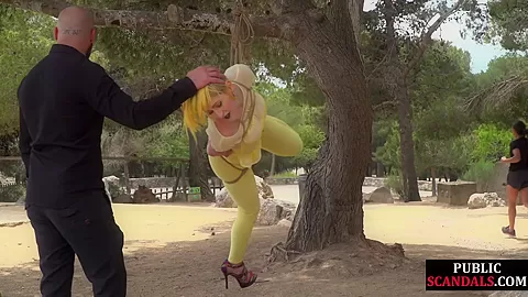 Femsub used in public suspension bondage with spanking