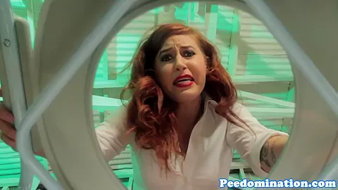 Harsh dominatrix teases toiletsub with pee