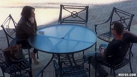 A beautiful girl is stood up by a real loser