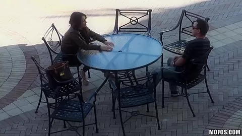 A beautiful girl is stood up by a real loser