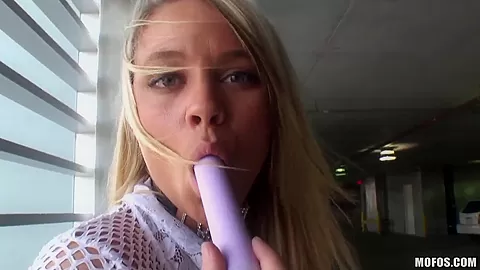 Young blonde Allexis stuffs her twat at parking lot