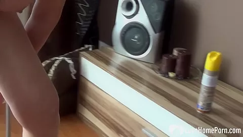 MILF lays down on the floor to masturbate
