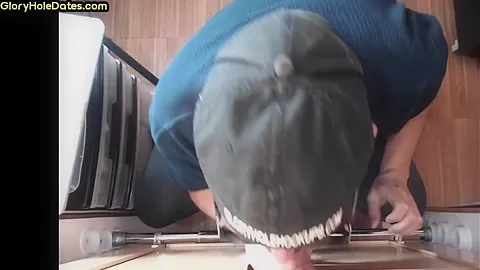 Gloryhole gay shows sucking skills while jerking it