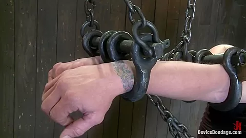 Felony Bound in Cruel Latex Metal and Leather Bondage
