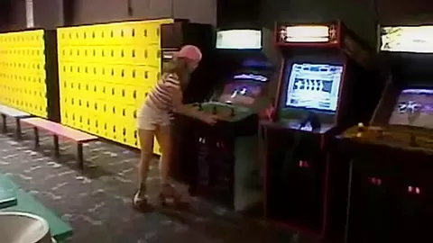 Public teen 18+ masturbates in arcade toilets