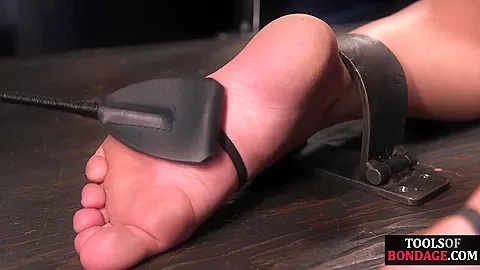 BDSM babe bigass spanked and feet whipped by master