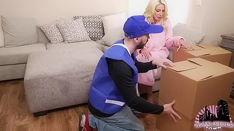 Mailman Delivers A Big Package To