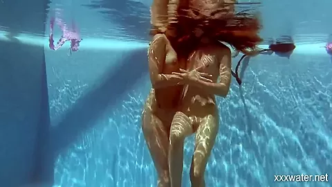 In The Indoor Pool, Two Stunning Girls Swim 5 Min