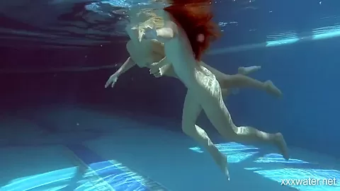 In The Indoor Pool, Two Stunning Girls Swim 5 Min