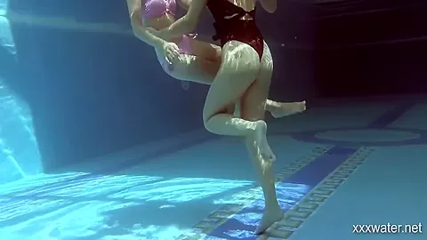 In The Indoor Pool, Two Stunning Girls Swim 5 Min