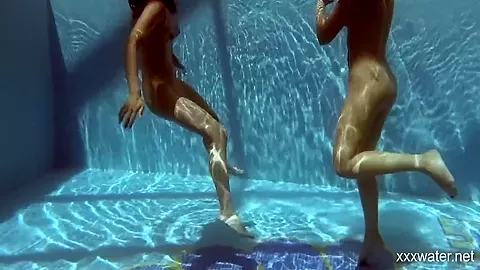 In The Indoor Pool, Two Stunning Girls Swim 5 Min