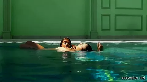 In The Indoor Pool, Two Stunning Girls Swim 5 Min