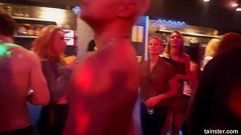 Lesbian pornstars licking their cunts in a club