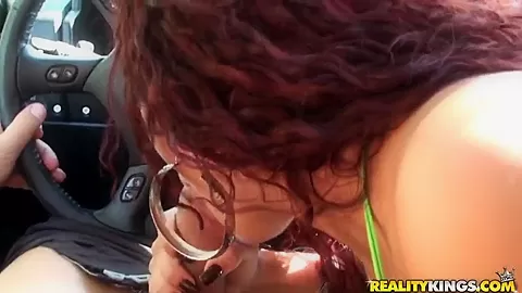 Melissa is sitiing in a car and showing her lovely and hot boobs