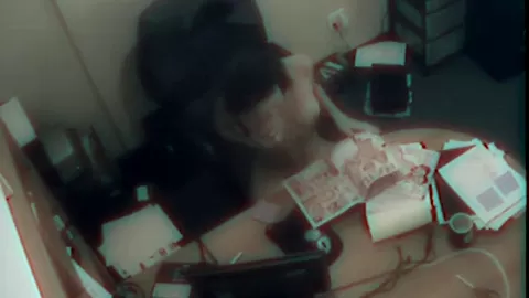 Office slut masturbates by her desk