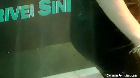 Wet girls dancing erotically in a club