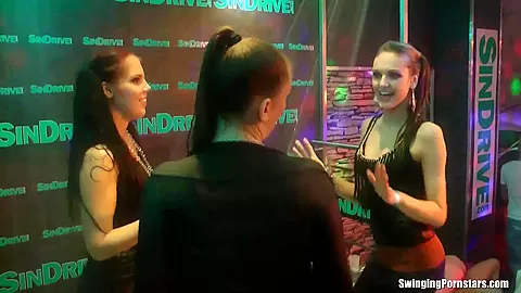 Wet girls dancing erotically in a club