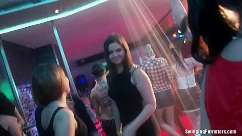 Slutty girls dancing erotically in a club