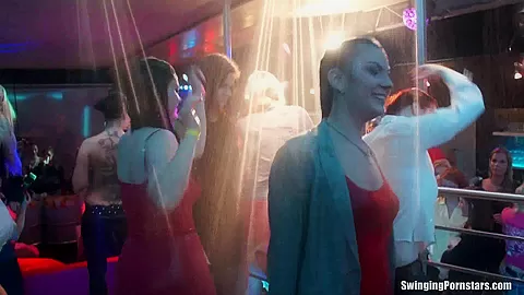 Slutty girls dancing erotically in a club