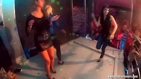 Slutty girls dancing erotically in a club