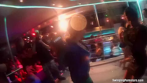Slutty girls dancing erotically in a club