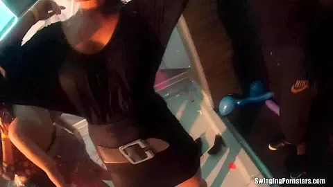 Slutty girls dancing erotically in a club