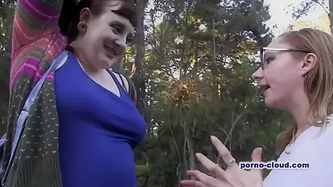 Outdoor lesbian licking.