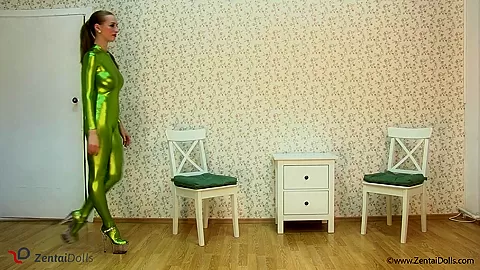 Spineless Lady In Shiny Green Catsuit - Watch4Fetish