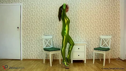 Spineless Lady In Shiny Green Catsuit - Watch4Fetish