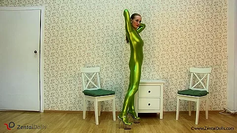 Spineless Lady In Shiny Green Catsuit - Watch4Fetish