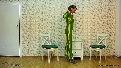 Spineless Lady In Shiny Green Catsuit - Watch4Fetish
