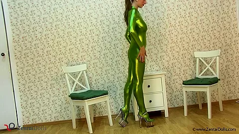 Spineless Lady In Shiny Green Catsuit - Watch4Fetish