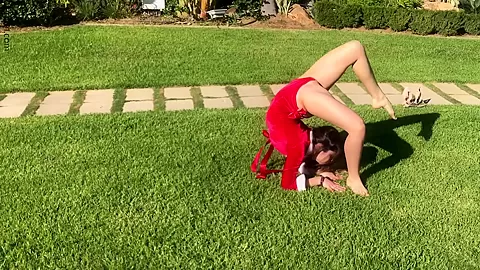 Stretching Outdoors In Red - Watch4Fetish