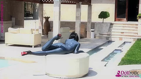 Naked Rubber Doll Relaxing By The Pool - Watch4Fetish