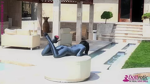 Naked Rubber Doll Relaxing By The Pool - Watch4Fetish