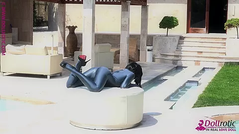 Naked Rubber Doll Relaxing By The Pool - Watch4Fetish