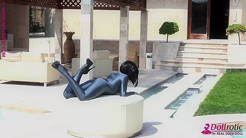 Naked Rubber Doll Relaxing By The Pool - Watch4Fetish