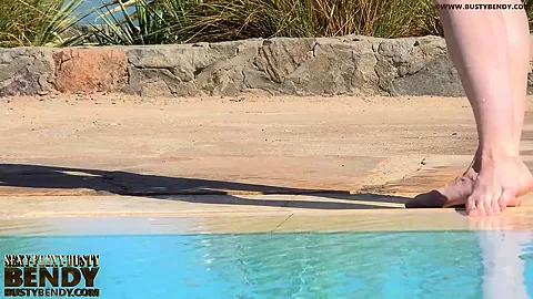 Stretching Eroticlly Outside Near The Pool - Watch4Fetish