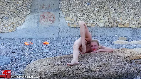 Naked And Flexible On The Beach - Watch4Fetish