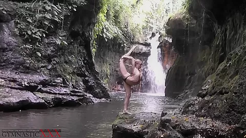 Flexible Beauty At The Waterfall - Watch4Fetish